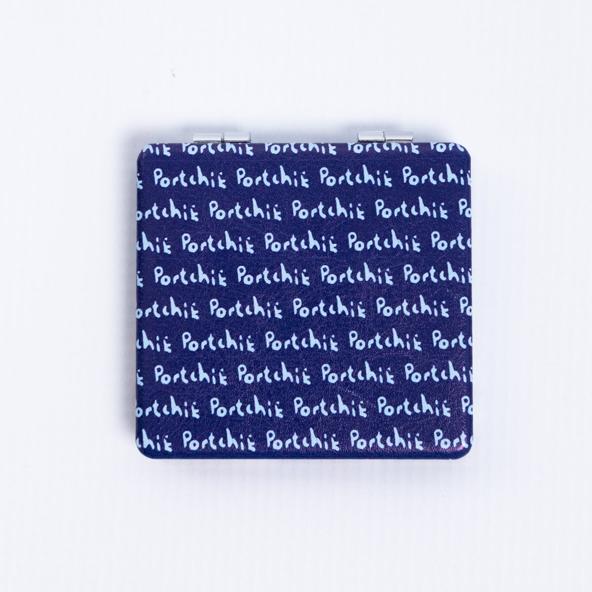 Portchie pocket mirror featuring the Two Cats On a Wall artwork, additional view