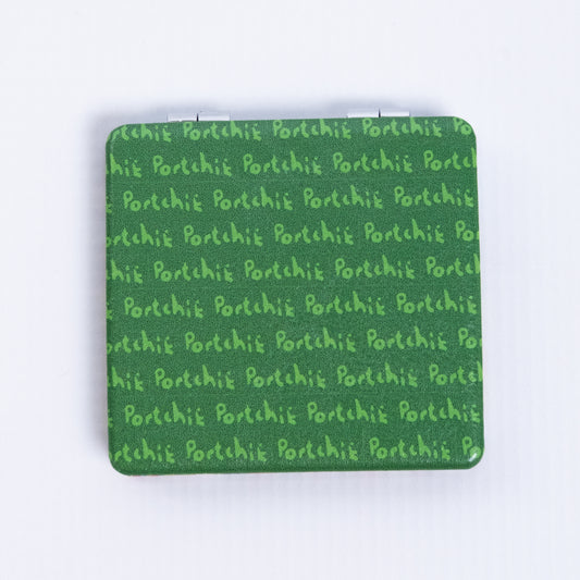 Portchie pocket mirror featuring the Flowers For Aunt Julieta artwork, additional view