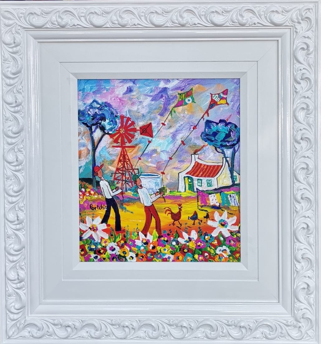 Two boys with kites near Windmill