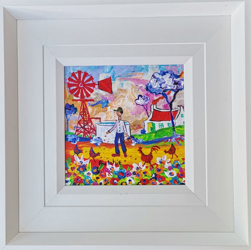 Boy feeding Chickens